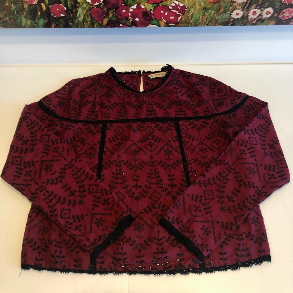 Long sleeve top with broderie anglaise.